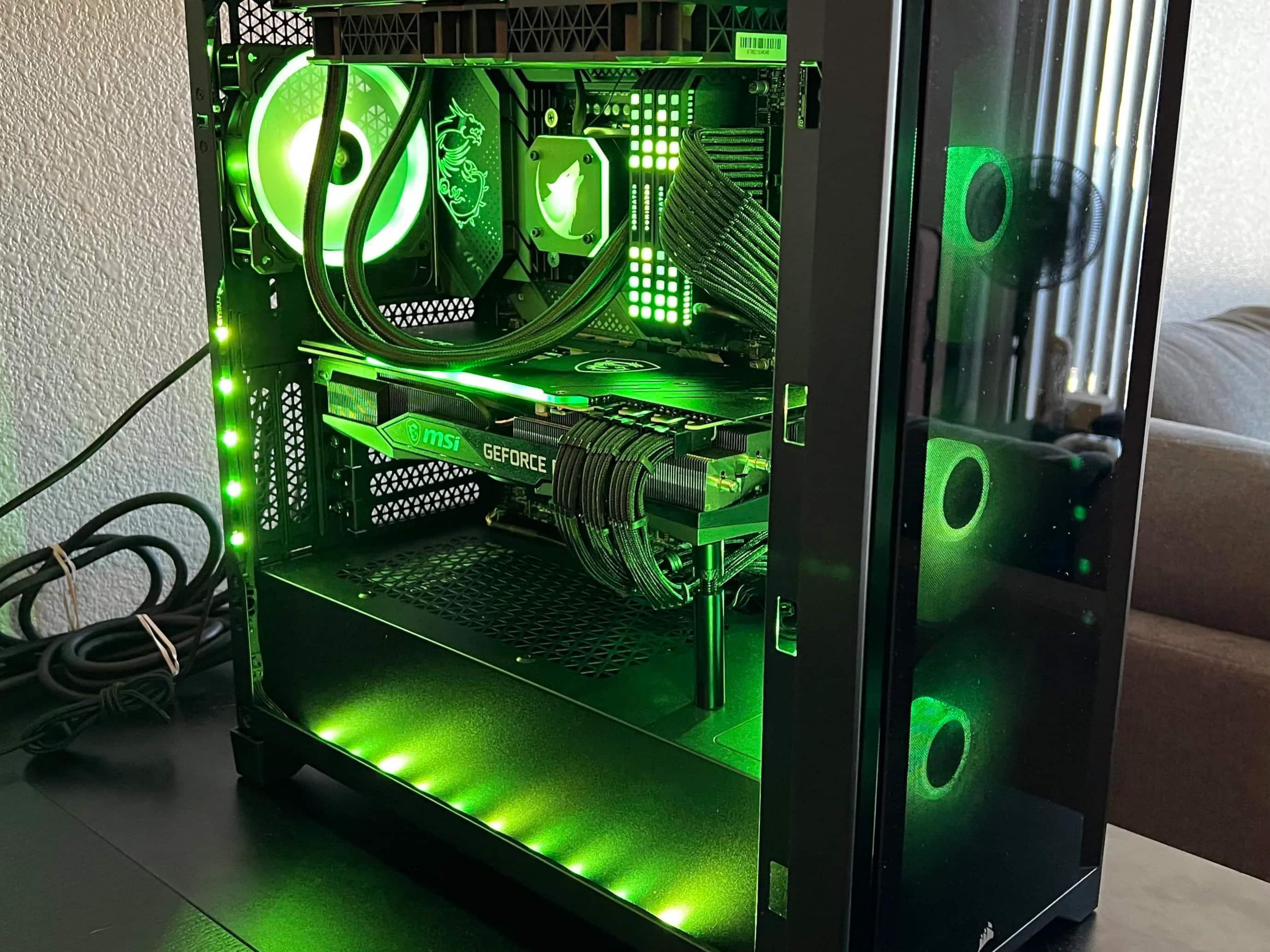 Close up of a high-end PC interior, lit up with a green RGB lighting scheme.